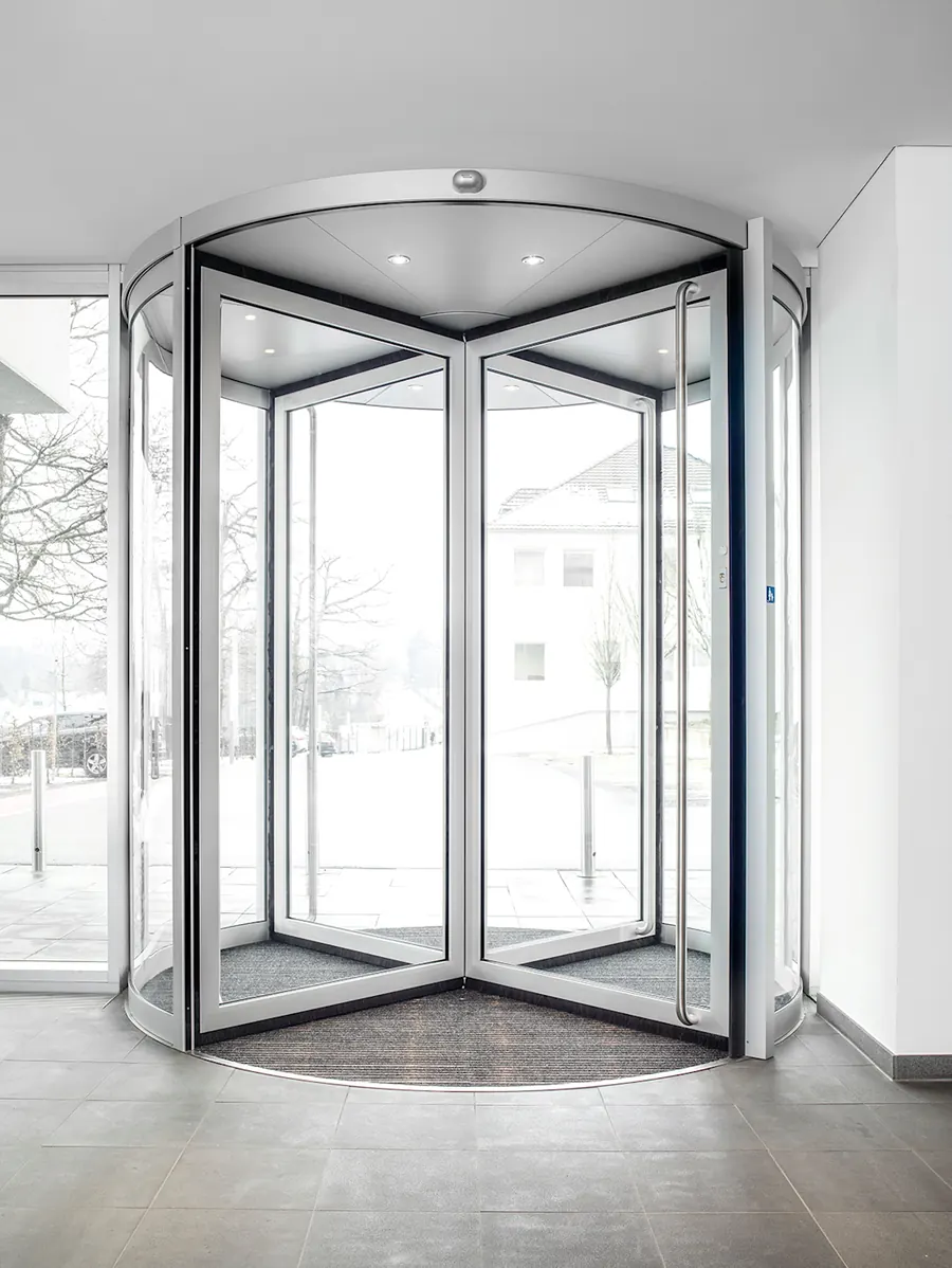 Puerta giratoria de vidrio dormakaba