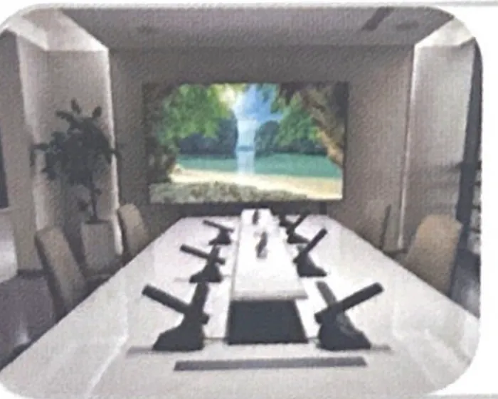 Sala de reuniones con pantalla de gran formato